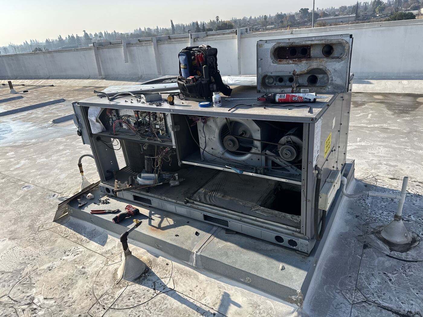 Rooftop unit opened up during a cracked heat exchanger replacement